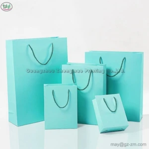 Customize Simple Logo Design White Cardboard Paper Bag For Gift Wholesale OEM Luxury Gift Packaging Bag