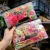 Import 100 pcs one bag girls cute head rope elastic hair bands kids small rubber band colored hair rope from China