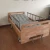 Import adjustable ward bed wooden medical bedside tables nursing bed for sale from China