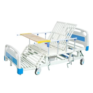 Cheap medical equipment folding handrail manual hospital bed with dining table