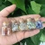 Factory Customized Wholesale Natural Crystal Rock Stone Mini Bottles Minerals Specimen Stone Wicca Reiki Healing Quartz