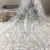 Import Fashion Dubai machine embroidered white flower lace fabric from China