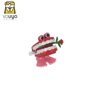 Hot Sale Plastic Custom Wind Up Cartoon Toys Jumping Teeth Toys For Dental Gift
