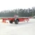 Import HUALU Manufacturers 40ft 12m Container Trailer Chassis Transport 20 Feet 40 ft Container Chassis Skeleton Trailer from China