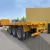 Import Low price 3 axles 40ft 45ft container cargo transport heavy duty flatbed semi traile from China