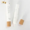 Plastic cosmetic eye cream tube with bamboo screw cap