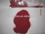 Red coloured sand for vases