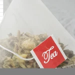 Triangle tea bag processing honeysuckle tea mint leaf chrysanthemum combination flower herbal tea OEM