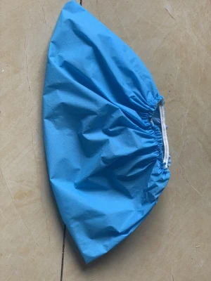Disposable shoe covers, surgical caps