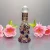 Import 20ml Arabic Style Handmade Glass Perfume Bottle with Metal Made Flower Decorations from China