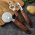 Import 8 pcs coating wood grain handle stainless steel kitchen tools and gadgets set for your kitchen from China