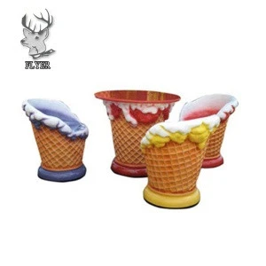 A variety of beautiful fiberglass ice cream cone chair and table