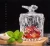 Import China glassware factory glass sugar bowl glass candy jar with butterfly design from China