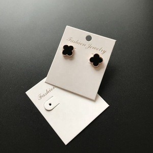 Custom 600g white matt cardboard jewelry display card with silver foil logo