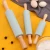 Import Customized Baking Utensils Food Grade Non-stick Easy Clean Silicone Rolling Pin with Solid Wooden Handle from China