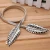 Import Exquisite fashion metal leaves women girls elastic stretch waist belt high quality chain belts for clothes dress decoration from China