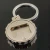Import high quality metal keychain bottlecap shape bottle opener from China