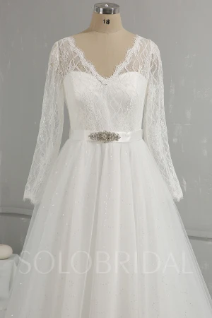 Ivory A line V neck long sleeves beaded belt shiny skirt low back corset wedding dress