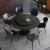 Import modern round dining table carbon steel stone top dining room table furniture with Turntable from China