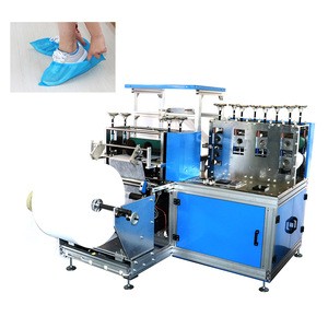 Putting on shoe covers machine packing cover nonwoven making