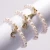 Import Top Quality 5 to 6mm Freshwater Pearl Beads Bracelet with Rainbow CZ Letter Charms from China