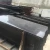 Import Vietnam hot selling Polished dyed black granite tiles stairs slab paving stone from China