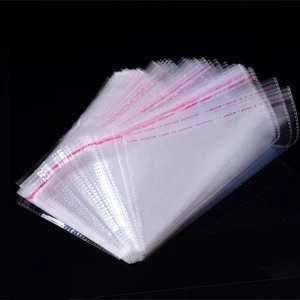 Wholesale cheap clear self adhesive seal clothes opp packing plastic bag /clear poly t-shirt bag