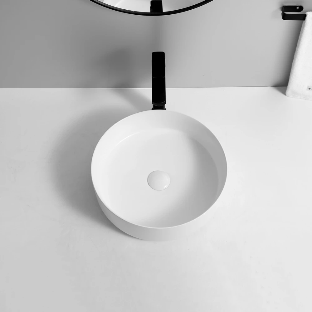 Wholesale sanitary ware matt white bathroom unique sink round shape ceramic bathroom wash basin