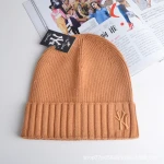Wholesale women man fashion warm acrylic knit embroider red black white color NY beanie hats winter NY hats