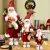 C221 High Quality Wholesale Standing Cute Artificial Santa Claus Father Christmas Decoration With Gift Bag And Presents