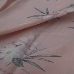Cheap price soft rayon slubbed yarn print  woven fabric for fashion lady dress garment