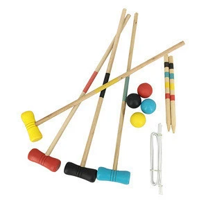 garden croquet with wooden balls and wooden croquet set