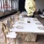Import Gold stainless steel  wedding hot design dining table set with 8 chairs from China