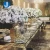 Import long table wedding reception ideas restaurant tables rectangular mirror glass stainless steel wood dining room table from China
