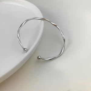 Fast Pace Simple and versatile  irregular Mobius bracelet for women with open ends