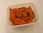 Whole cooked frozen crab