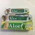 Import 105g OEM cheap customize brands logo mint flavor aloe vera essence whitening toothpaste from China