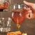 Import 200ML Kitchen Juice Syrup Container Jar Pot Transparent Honey Drip Dispenser from China