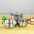 Import kichen accessories induction metal stainless steel cooking pots and pans cookware sets from China