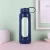 Import Newest Design Top Quality Cylinder Glass Water Bottle With Plastic Sleeve from China