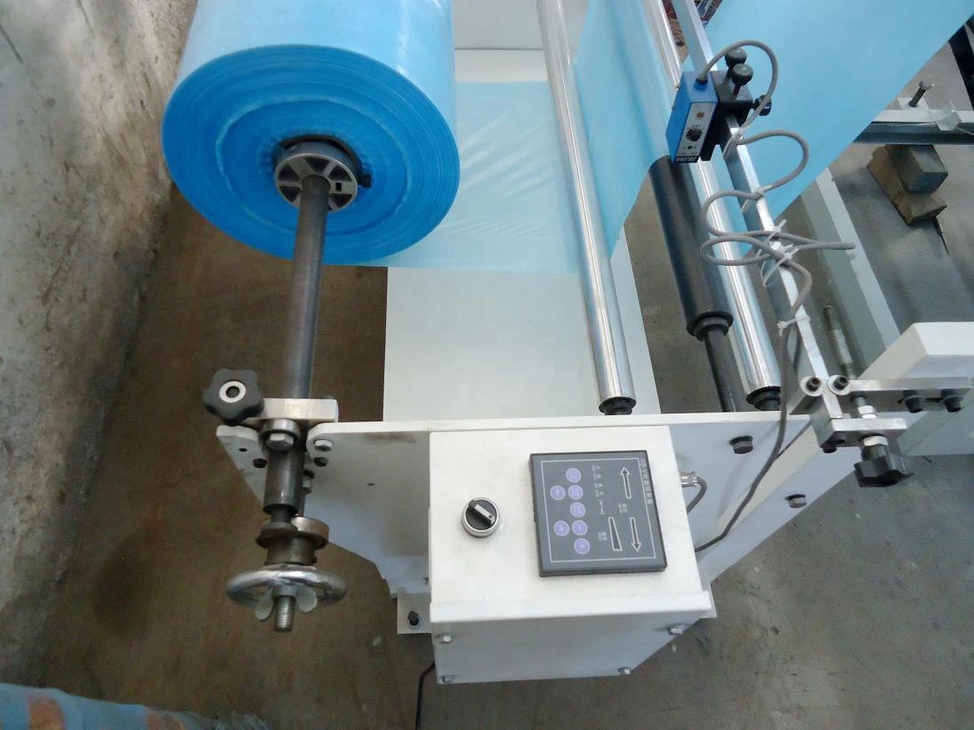 Polythene Overall Making Machine Disposable PE Plastic Apron Cutting Machine