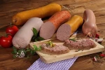 Textile coated sausage casings