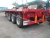 Import cimc tri-axle 40ft flatbed container truck semi trailer from China
