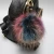 Import 2016 multicolor plush fur pom poms charms fancy raccoon fur keychains keyring from China