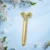 Import 2019 High Quality Beauty product Gold Bar Face Roller Massager from China