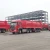 Import 3 Axles 50 Tons Automatic Belt Discharge Crawler Dump Semi Truck Trailer from China