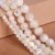 Import 4-14mm white mother of pearl shell/nacre round beads from China