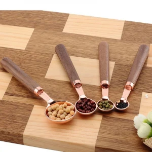 8 piece copper plated measuring cups and measuring spoons set with wooden handle