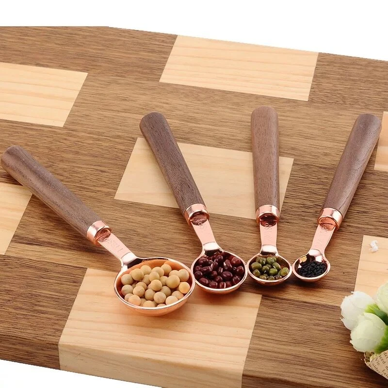 8 piece copper plated measuring cups and measuring spoons set with wooden handle
