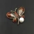 Import Custom Women Alloy Butterfly Jewelry Metal Brooches Zircon Natural Pearl Korea Brooch For Girls from China